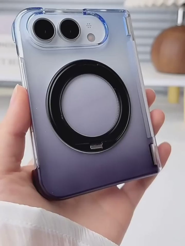 A hand opens and rotates the ring stand on a purple-to-black gradient folding phone case.
